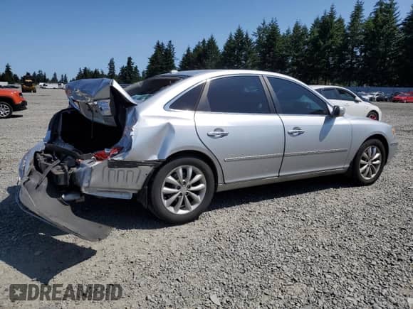 2007 Hyundai Azera SE с VIN KMHFC46F77A241607, выставлен на аукционе Copart как лот 59318345 с пробегом 198 664 миль миль и Списание • Salvage title. История ставок и продаж доступна на DreamBid. Изображение 3.