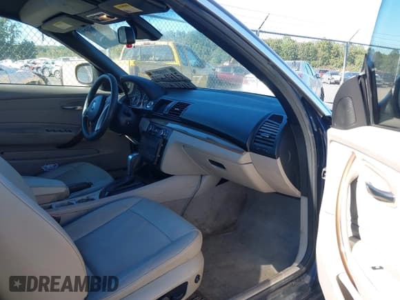 ✅ 2010 BMW 1 Series 128i • VIN: WBAUN1C59AVH81847 • Lot: 40496951. Listed on IAAI with 148,463 mi. Free auction sales archive from the USA and detailed vehicle history report at DreamBid. Image 5.