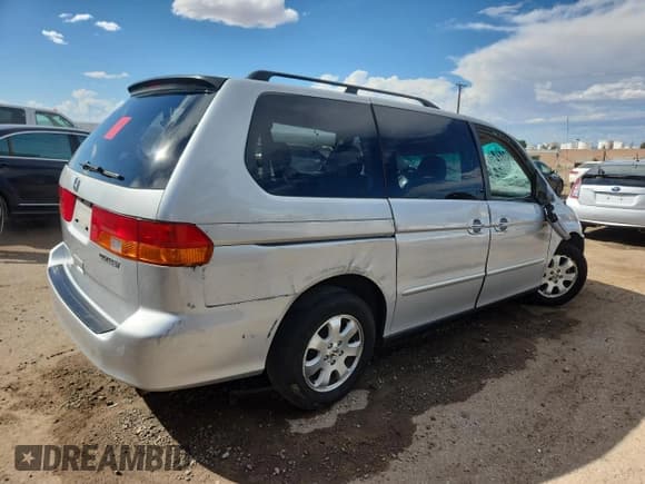 ✅ 2002 Honda Odyssey EX • VIN: 2HKRL18632H538291 • Lot: 80021945. Listed on Copart with Not provided. Free auction sales archive from the USA and detailed vehicle history report at DreamBid. Image 3.