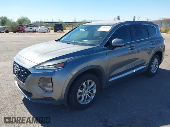✅ 2019 Hyundai Santa Fe SE • VIN: 5NMS23AD8KH030713 • Lot: 43592667. Wystawiony na IAAI z przebiegiem 74 344 mil. Bezpłatny archiwum sprzedaży aukcyjnych z USA i szczegółowy raport historii pojazdu na DreamBid. Zdjęcie 17.
