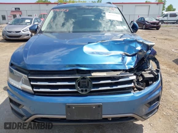 ✅ 2018 Volkswagen Tiguan S • VIN: 3VV0B7AX4JM087786 • Lot: 42941983. Listed on IAAI with 87,202 mi. Free auction sales archive from the USA and detailed vehicle history report at DreamBid. Image 6.