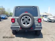 ✅ 2022 Jeep Wrangler Unlimited Sahara • VIN: 1C4HJXEM7NW206585 • Lot: 42102516. Listed on IAAI with 10,769 mi. Free auction sales archive from the USA and detailed vehicle history report at DreamBid. Image 17.