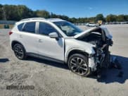 ✅ 2016 Mazda CX-5 Grand Touring • VIN: JM3KE4DY1G0669008 • Lot: 86889025. Listed on Copart with Not provided. Free auction sales archive from the USA and detailed vehicle history report at DreamBid. Image 4.