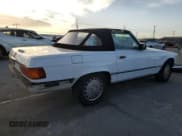 ✅ 1989 Mercedes-Benz 560 SL • VIN: WDBBA48D7KA100290 • Lot: 85049924. Listed on Copart with 88,919 mi. Free auction sales archive from the USA and detailed vehicle history report at DreamBid. Image 3.