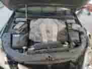 2014 Hyundai Genesis 3.8L z VIN KMHGC4DD7EU264239, wystawiony jako Copart lot #69198604 z przebiegiem 171 305 mil mil oraz Szkoda całkowita • Salvage title. Historia ofert i sprzedaży dostępna na DreamBid. Obrazek 11.