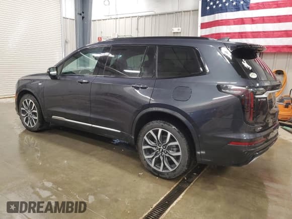 ✅ 2021 Cadillac XT6 Sport • VIN: 1GYKPHRS6MZ208757 • Lot: 64777955. Listed on Copart with 64,370 mi. Free auction sales archive from the USA and detailed vehicle history report at DreamBid. Image 2.