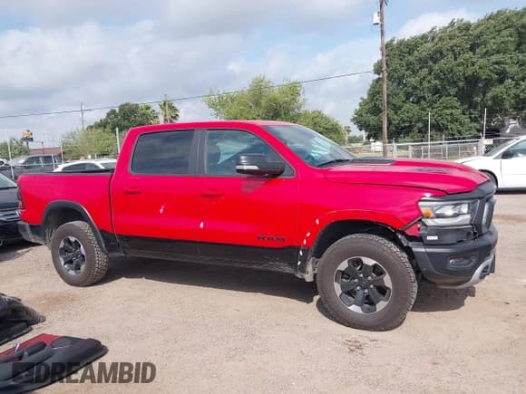 ✅ 2021 Ram 1500 Rebel • VIN: 1C6SRFLT8MN595963 • Lot: 42464838. Listed on IAAI with Not provided. Free auction sales archive from the USA and detailed vehicle history report at DreamBid. Image 14.