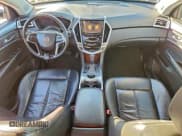✅ 2013 Cadillac SRX • VIN: 3GYFNAE31DS638948 • Lot: 93100945. Wystawiony na Copart z przebiegiem 164 037 mil. Bezpłatny archiwum sprzedaży aukcyjnych z USA i szczegółowy raport historii pojazdu na DreamBid. Zdjęcie 8.