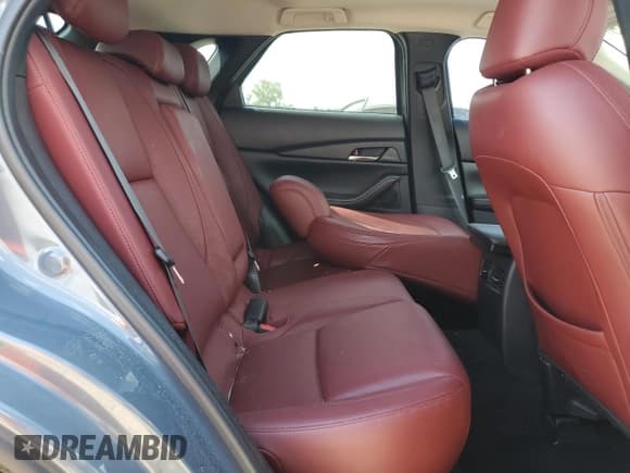 ✅ 2022 Mazda CX-30 S Carbon Edition • VIN: 3MVDMBCL8NM414346 • Лот: 71610055. Опубликован ранее на Copart с пробегом Не указан. Бесплатный доступ к архиву аукционных продаж из США и подробный отчёт об истории автомобиля на DreamBid. Изображение 11.