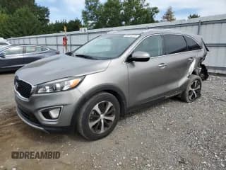 ✅ 2018 Kia Sorento EX • VIN: 5XYPH4A57JG395461 • Лот: 68913215. Опубликован ранее на Copart с пробегом 209 644 миль. Бесплатный доступ к архиву аукционных продаж из США и подробный отчёт об истории автомобиля на DreamBid. Изображение 1.