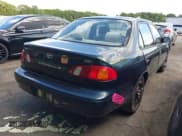 ✅ 1999 Toyota Corolla VE • VIN: 2T1BR12EXXC125004 • Лот: 42189827. Опубликован ранее на IAAI с пробегом 159 460 миль. Бесплатный доступ к архиву аукционных продаж из США и подробный отчёт об истории автомобиля на DreamBid. Изображение 4.