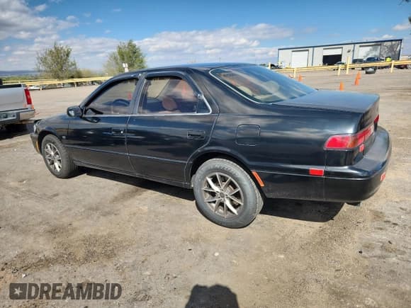 ✅ 1998 Toyota Camry LE • VIN: JT2BF22K9W0125551 • Lot: 86504565. Listed on Copart with 202,097 mi. Free auction sales archive from the USA and detailed vehicle history report at DreamBid. Image 2.