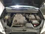 ✅ 2008 Kia Rondo LX • VIN: KNAFG526987124689 • Лот: 71624324. Опубликован ранее на Copart с пробегом 157 291 миль. Бесплатный доступ к архиву аукционных продаж из США и подробный отчёт об истории автомобиля на DreamBid. Изображение 14.