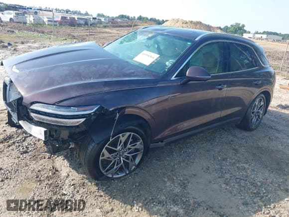 ✅ 2022 Genesis GV70 2.5T • VIN: KMUMADTB9NU050430 • Lot: 41990564. Listed on IAAI with 36,308 mi. Free auction sales archive from the USA and detailed vehicle history report at DreamBid. Image 17.