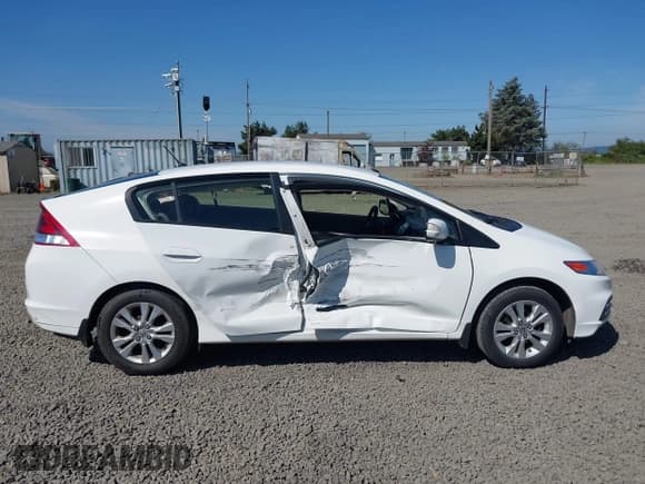 ✅ 2014 Honda Insight EX • VIN: JHMZE2H71ES002369 • Лот: 42455582. Опубликован ранее на IAAI с пробегом 114 331 миль. Бесплатный доступ к архиву аукционных продаж из США и подробный отчёт об истории автомобиля на DreamBid. Изображение 13.