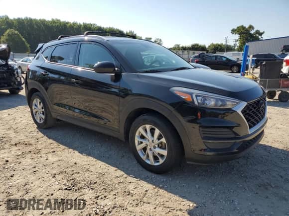 2021 Hyundai Tucson Value with VIN KM8J33A47MU407547, listed as a Copart auction lot 69693105 with 173,694 mi miles and Salvage title. Bid and sale history available at DreamBid. Image 4.