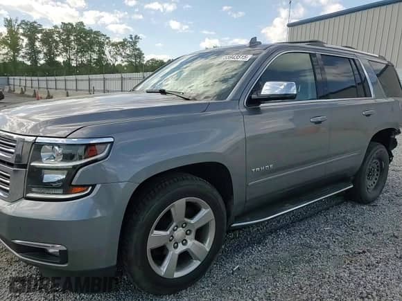 2020 Chevrolet Tahoe Premier with VIN 1GNSKCKC1LR216510, listed as a Copart auction lot 57627705 with 113,495 mi miles and Salvage title. Bid and sale history available at DreamBid. Image 15.