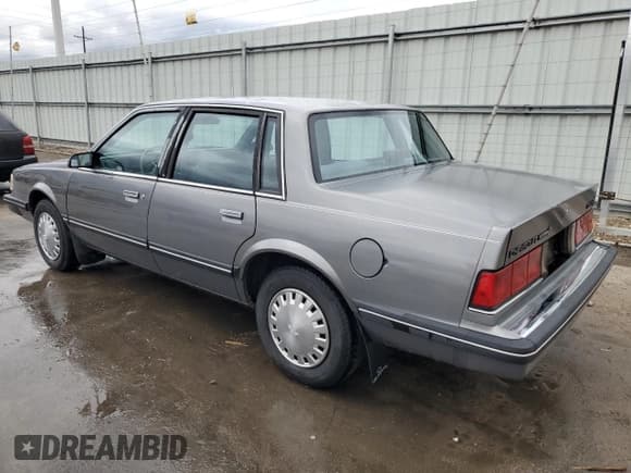 ✅ 1986 Chevrolet Celebrity • VIN: 1G1AW19R2G6204132 • Лот: 58819705. Опубликован ранее на Copart с пробегом 63 184 миль. Бесплатный доступ к архиву аукционных продаж из США и подробный отчёт об истории автомобиля на DreamBid. Изображение 2.