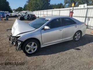 2014 Toyota Camry SE with VIN 4T1BF1FK7EU366801, listed as a Copart auction lot 85089665 with 180,877 mi miles and Salvage title. Bid and sale history available at DreamBid. Image 1.