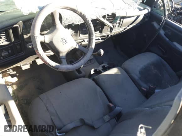 2001 Chevrolet Silverado 1500 с VIN 1GCEK14W11Z140558, выставлен на аукционе Copart как лот 76209344 с пробегом Не указан миль и На запчасти • Non repairable. История ставок и продаж доступна на DreamBid. Изображение 8.