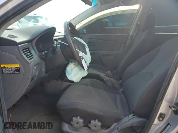 ✅ 2006 Kia Rio • VIN: KNADE123466101514 • Lot: 57590235. Listed on Copart with 208,185 mi. Free auction sales archive from the USA and detailed vehicle history report at DreamBid. Image 7.