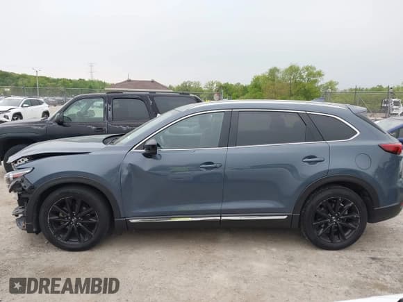 ✅ 2023 Mazda CX-9 Grand Touring • VIN: JM3TCBDY2P0636226 • Lot: 42384360. Listed on IAAI with 161,352 mi. Free auction sales archive from the USA and detailed vehicle history report at DreamBid. Image 15.