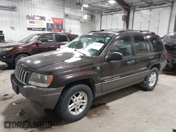 ✅ 2004 Jeep Grand Cherokee Laredo • VIN: 1J4GW48S34C278819 • Lot: 43835097. Listed on IAAI with 144,263 mi. Free auction sales archive from the USA and detailed vehicle history report at DreamBid. Image 2.