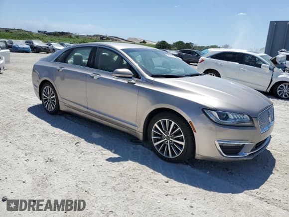 ✅ 2019 Lincoln MKZ Hybrid • VIN: 3LN6L5KU9KR614753 • Lot: 53488715. Listed on Copart with 66,766 mi. Free auction sales archive from the USA and detailed vehicle history report at DreamBid. Image 4.