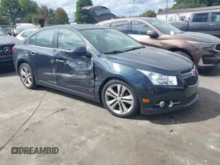 ✅ 2014 Chevrolet Cruze LTZ • VIN: 1G1PG5SB5E7235409 • Lot: 43376675. Listed on IAAI with 129,281 mi. Free auction sales archive from the USA and detailed vehicle history report at DreamBid. Image 1.