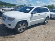 ✅ 2014 Jeep Grand Cherokee Overland • VIN: 1C4RJFCG0EC238873 • Lot: 42436535. Listed on IAAI with 154,384 mi. Free auction sales archive from the USA and detailed vehicle history report at DreamBid. Image 17.