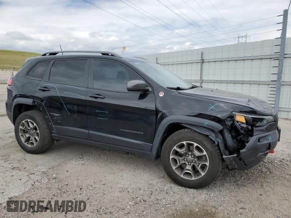 ✅ 2020 Jeep Cherokee Trailhawk • VIN: 1C4PJMBX5LD562549 • Lot: 63055805. Listed on Copart with 100,274 mi. Free auction sales archive from the USA and detailed vehicle history report at DreamBid. Image 4.