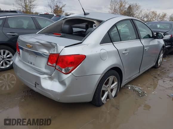 2014 Chevrolet Cruze 2LT with VIN 1G1PE5SB0E7135532, listed as a IAAI auction lot 43507178 with 100,363 mi miles and . Bid and sale history available at DreamBid. Image 4.