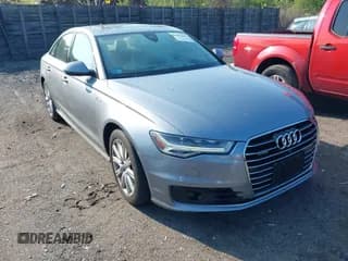 ✅ 2016 Audi A6 Prestige • VIN: WAUHGAFC0GN008180 • Lot: 42350647. Wystawiony na IAAI z przebiegiem 115 383 mil. Bezpłatny archiwum sprzedaży aukcyjnych z USA i szczegółowy raport historii pojazdu na DreamBid. Zdjęcie 1.