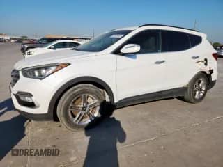2018 Hyundai Santa Fe 2.4L с VIN 5XYZU3LB3JG528542, выставлен на аукционе Copart как лот 83848405 с пробегом 58 071 миль миль и Списание • Salvage title. История ставок и продаж доступна на DreamBid. Изображение 1.