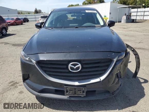✅ 2017 Mazda CX-9 Sport • VIN: JM3TCABY6H0131479 • Lot: 57178805. Listed on Copart with 98,698 mi. Free auction sales archive from the USA and detailed vehicle history report at DreamBid. Image 5.