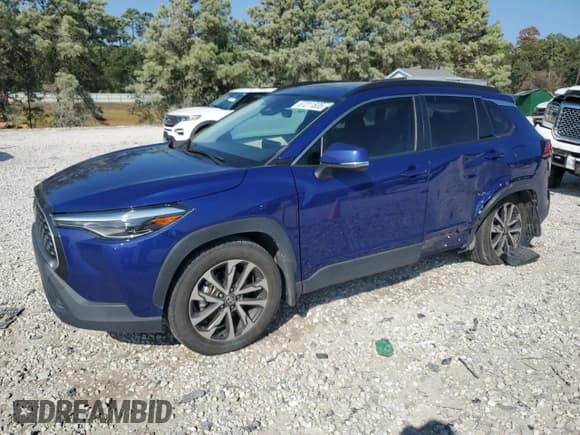 ✅ 2023 Toyota Corolla Cross XLE • VIN: 7MUDAAAG5PV051183 • Lot: 87211835. Listed on Copart with 34,039 mi. Free auction sales archive from the USA and detailed vehicle history report at DreamBid. Image 1.