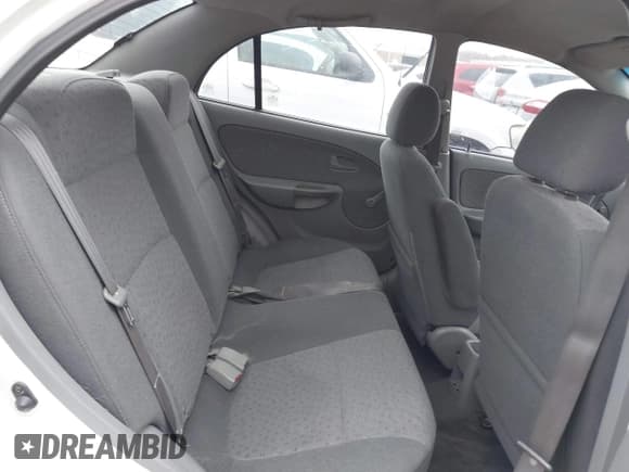 ✅ 2005 Kia Rio • VIN: KNADC125856400669 • Lot: 41165059. Listed on IAAI with 181,338 mi. Free auction sales archive from the USA and detailed vehicle history report at DreamBid. Image 8.