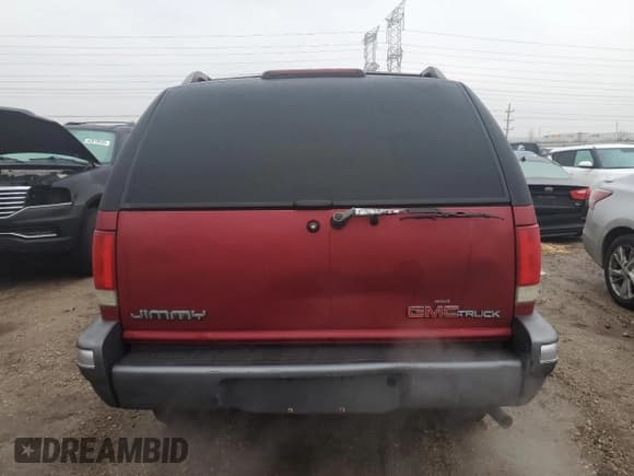 ✅ 1995 GMC Jimmy SLE Convenience • VIN: 1GKDT13W0S2519253 • Lot: 43536865. Listed on Copart with 121,556 mi. Free auction sales archive from the USA and detailed vehicle history report at DreamBid. Image 6.