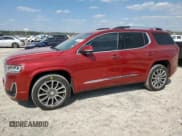 ✅ 2021 GMC Acadia Denali • VIN: 1GKKNPLS1MZ120282 • Lot: 73734034. Listed on Copart with 85,568 mi. Free auction sales archive from the USA and detailed vehicle history report at DreamBid. Image 1.