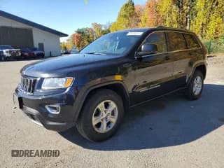 ✅ 2015 Jeep Grand Cherokee Laredo • VIN: 1C4RJFAG4FC738412 • Lot: 82581815. Listed on Copart with 205,872 mi. Free auction sales archive from the USA and detailed vehicle history report at DreamBid. Image 1.