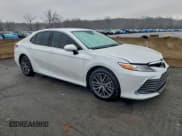 ✅ 2022 Toyota Camry Hybrid XLE • VIN: 4T1F31AK3NU599530 • Lot: 94351865. Wystawiony na Copart z przebiegiem 38 250 mil. Bezpłatny archiwum sprzedaży aukcyjnych z USA i szczegółowy raport historii pojazdu na DreamBid. Zdjęcie 4.