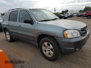 ✅ 2003 Mazda Tribute LX • VIN: 4F2YZ94123KM49852 • Lot: 71779054. Wystawiony na Copart z przebiegiem 263 938 mil. Bezpłatny archiwum sprzedaży aukcyjnych z USA i szczegółowy raport historii pojazdu na DreamBid. Zdjęcie 4.