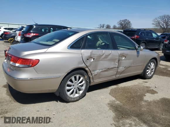 2008 Hyundai Azera Limited с VIN KMHFC46F58A288605, выставлен на аукционе Copart как лот 50295685 с пробегом 163 023 миль миль и На запчасти • Non repairable. История ставок и продаж доступна на DreamBid. Изображение 3.