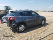 ✅ 2013 Mazda CX-5 Sport • VIN: JM3KE2BE1D0120692 • Lot: 68158835. Listed on Copart with 142,436 mi. Free auction sales archive from the USA and detailed vehicle history report at DreamBid. Image 3.