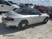 ✅ 2003 Porsche 911 • VIN: WP0CA29903S653377 • Лот: 66890114. Опубликован ранее на Copart с пробегом Не указан. Бесплатный доступ к архиву аукционных продаж из США и подробный отчёт об истории автомобиля на DreamBid. Изображение 3.