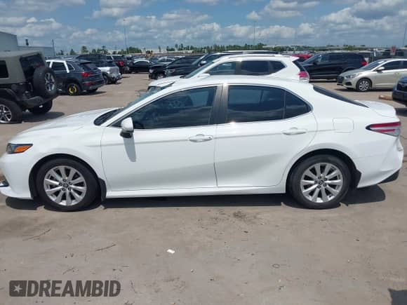 2019 Toyota Camry LE z VIN 4T1B11HK6KU276241, wystawiony jako IAAI lot #42379029 z przebiegiem 81 411 mil mil oraz . Historia ofert i sprzedaży dostępna na DreamBid. Obrazek 15.