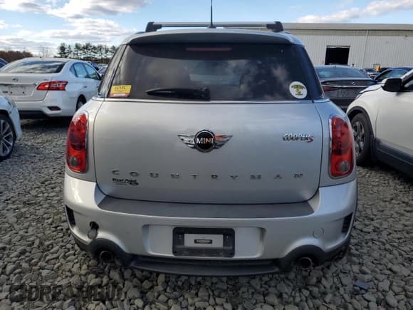 ✅ 2013 MINI Countryman S • VIN: WMWZC3C58DWP23750 • Lot: 91778855. Listed on Copart with 119,786 mi. Free auction sales archive from the USA and detailed vehicle history report at DreamBid. Image 6.