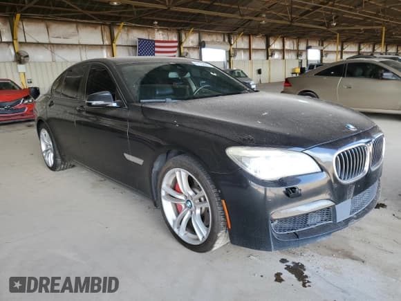 ✅ 2015 BMW 7 Series 750i • VIN: WBAYA8C58FG197731 • Lot: 81152265. Listed on Copart with 144,762 mi. Free auction sales archive from the USA and detailed vehicle history report at DreamBid. Image 4.