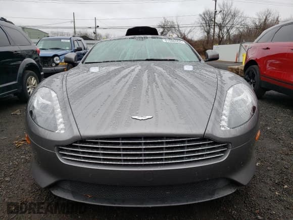✅ 2015 Aston Martin DB9 • VIN: SCFFDAEM9FGA16279 • Lot: 81886554. Listed on Copart with 25,029 mi. Free auction sales archive from the USA and detailed vehicle history report at DreamBid. Image 5.