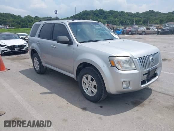 2010 Mercury Mariner z VIN 4M2CN8B77AKJ29263, wystawiony jako IAAI lot #42865830 z przebiegiem 138 528 mil mil oraz . Historia ofert i sprzedaży dostępna na DreamBid. Obrazek 1.